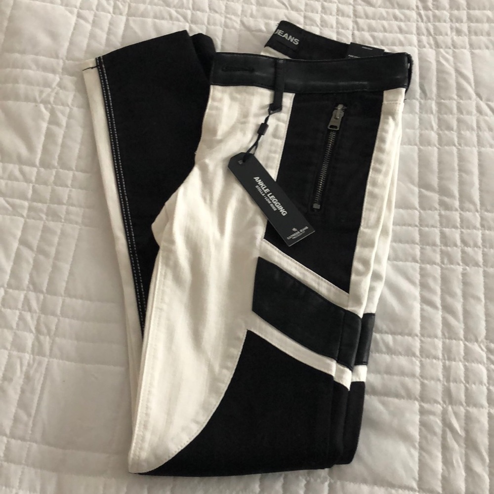 Sexy white jean with black leather details.